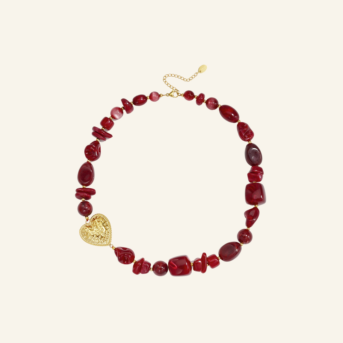 Beaded heart necklace – bordeaux on beige background