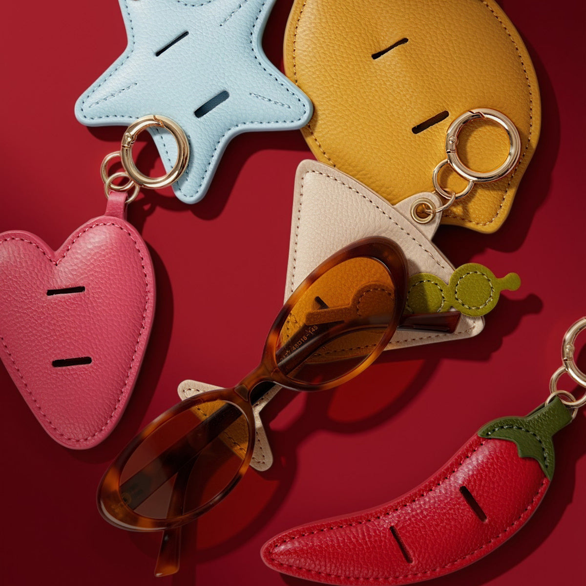 Olives bag charm beige with other bag charms