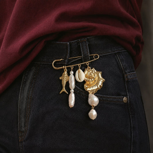Schelp vis parel broche goud wit