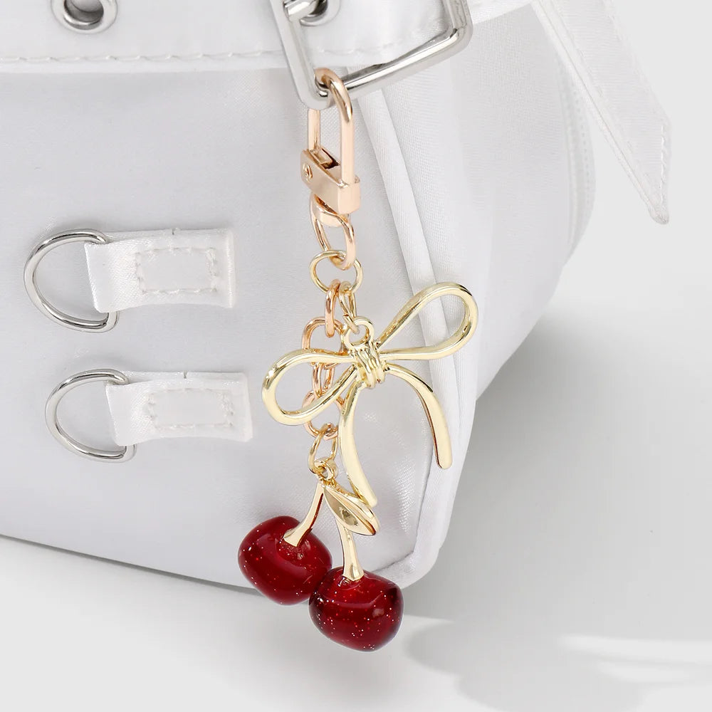 Kersen met strik bag charm rood
