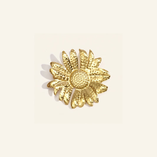 Bloem broche goud van Noxie The Label, voorkant