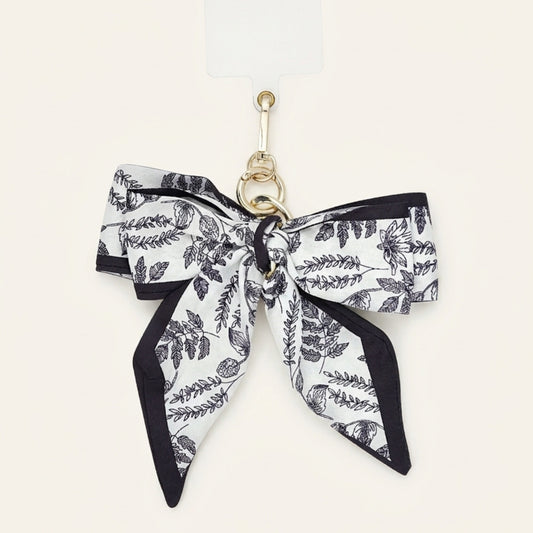 Strik van stof bag charm lichtblauw