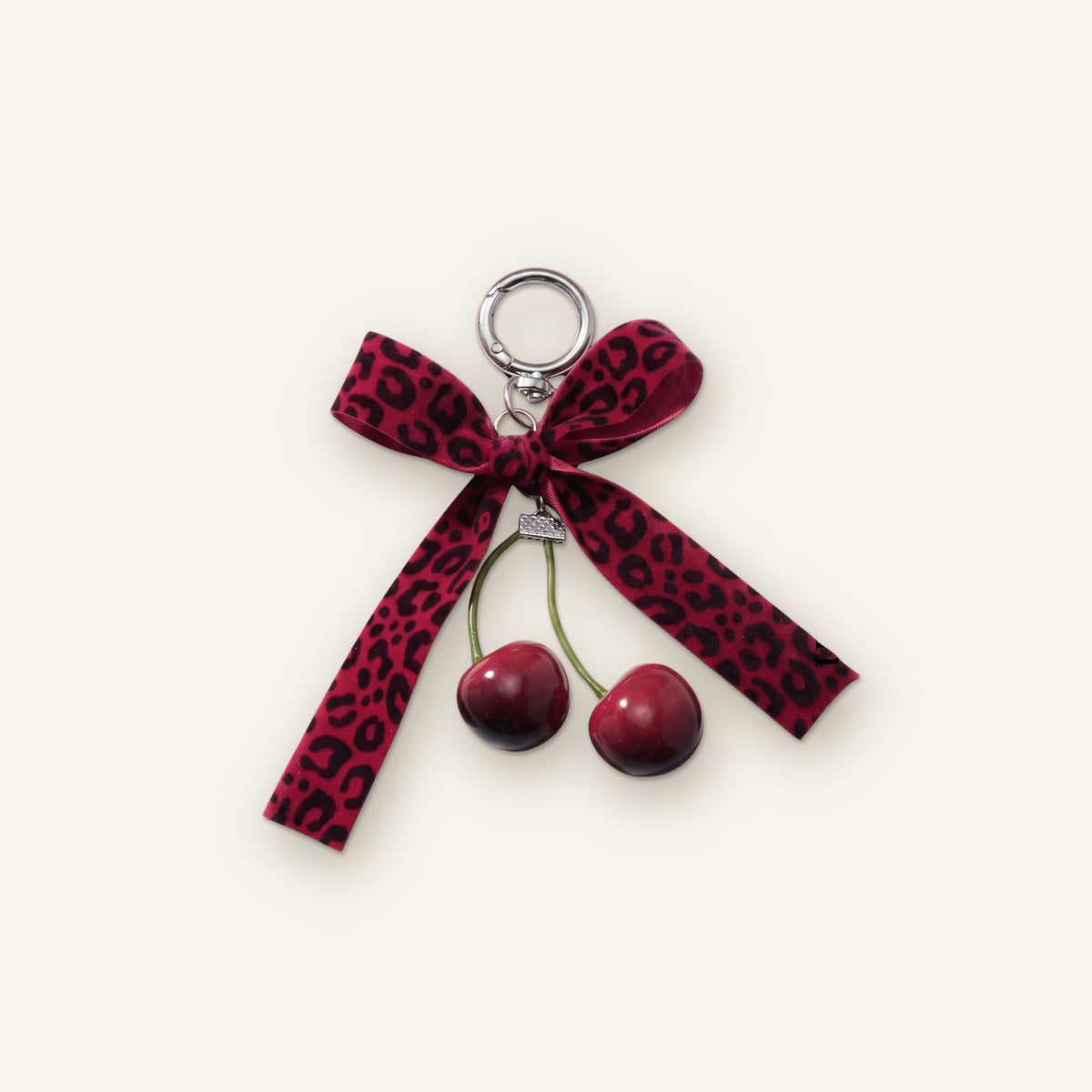Kersen met panterprint strik bag charm
