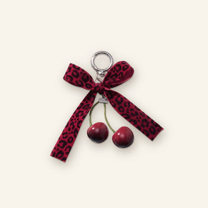 Kersen met panterprint strik bag charm