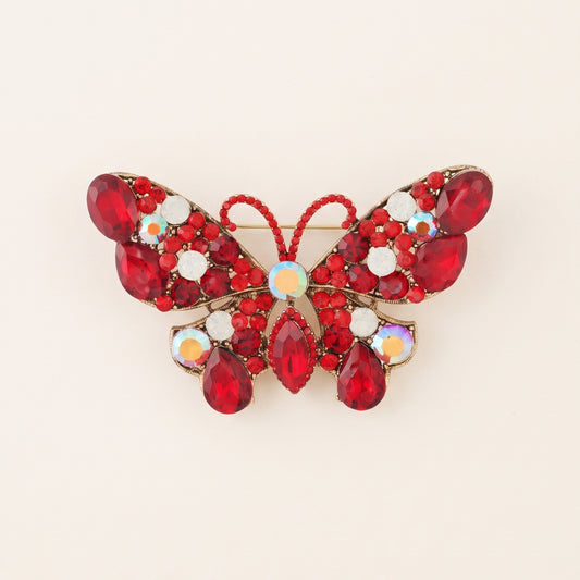 Vlinder broche strass rood