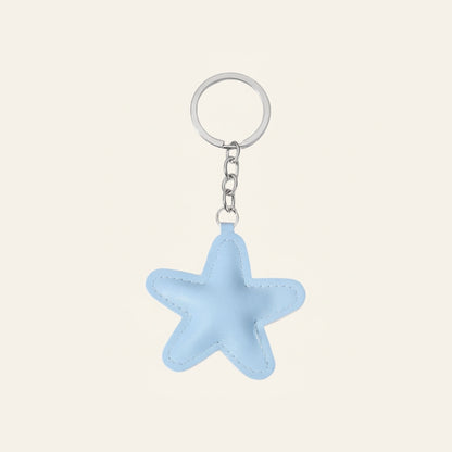 Ster van stof bag charm lichtblauw