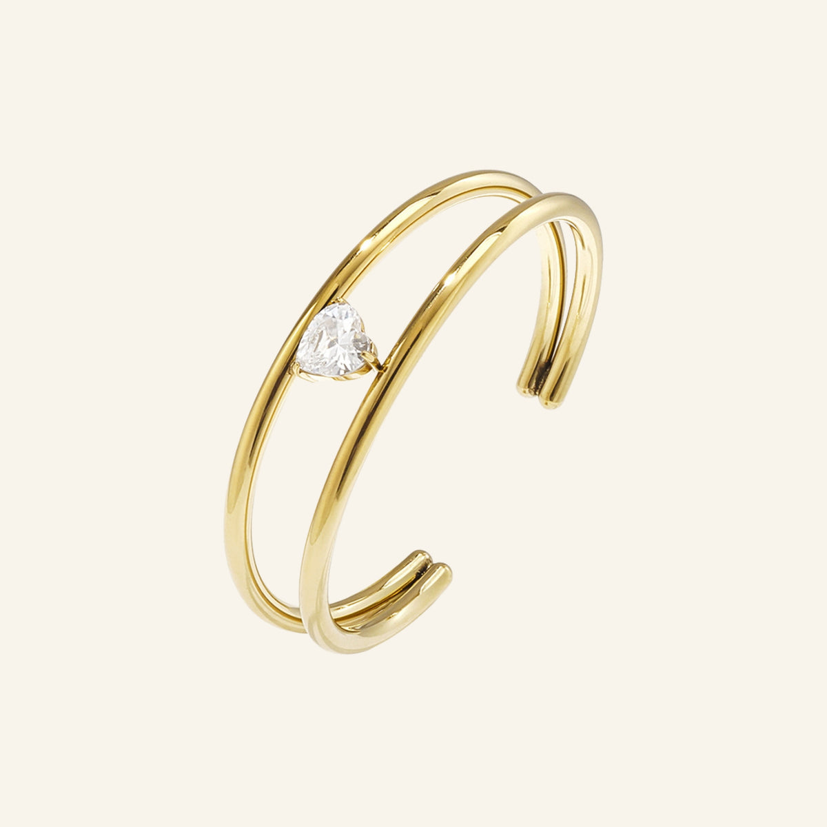 Dubbele manchet armband met steen – goud vrijstaand op beige