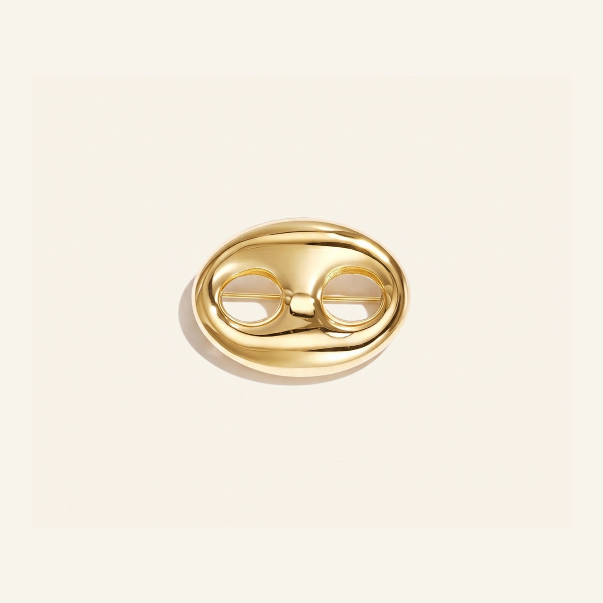 Link brooch gold
