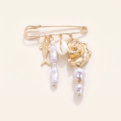Schelp vis parel broche goud wit