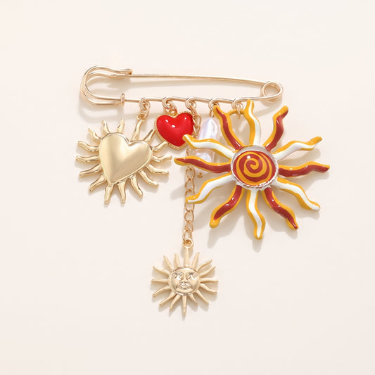 Zon en hart broche goud rood