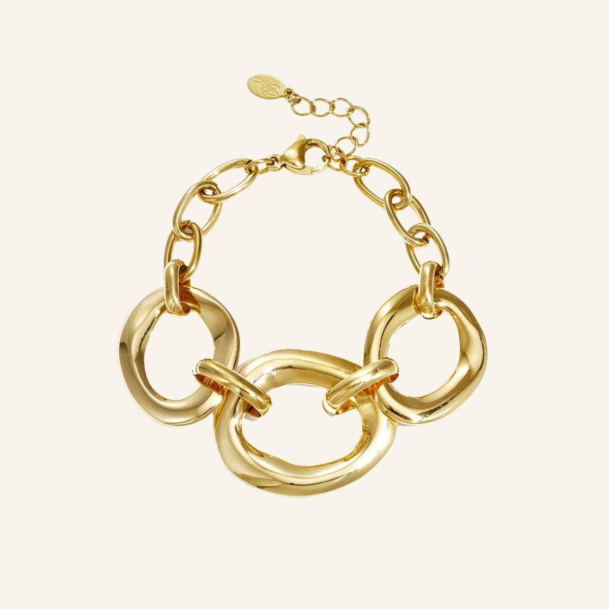 Gold round link bracelet – on beige background