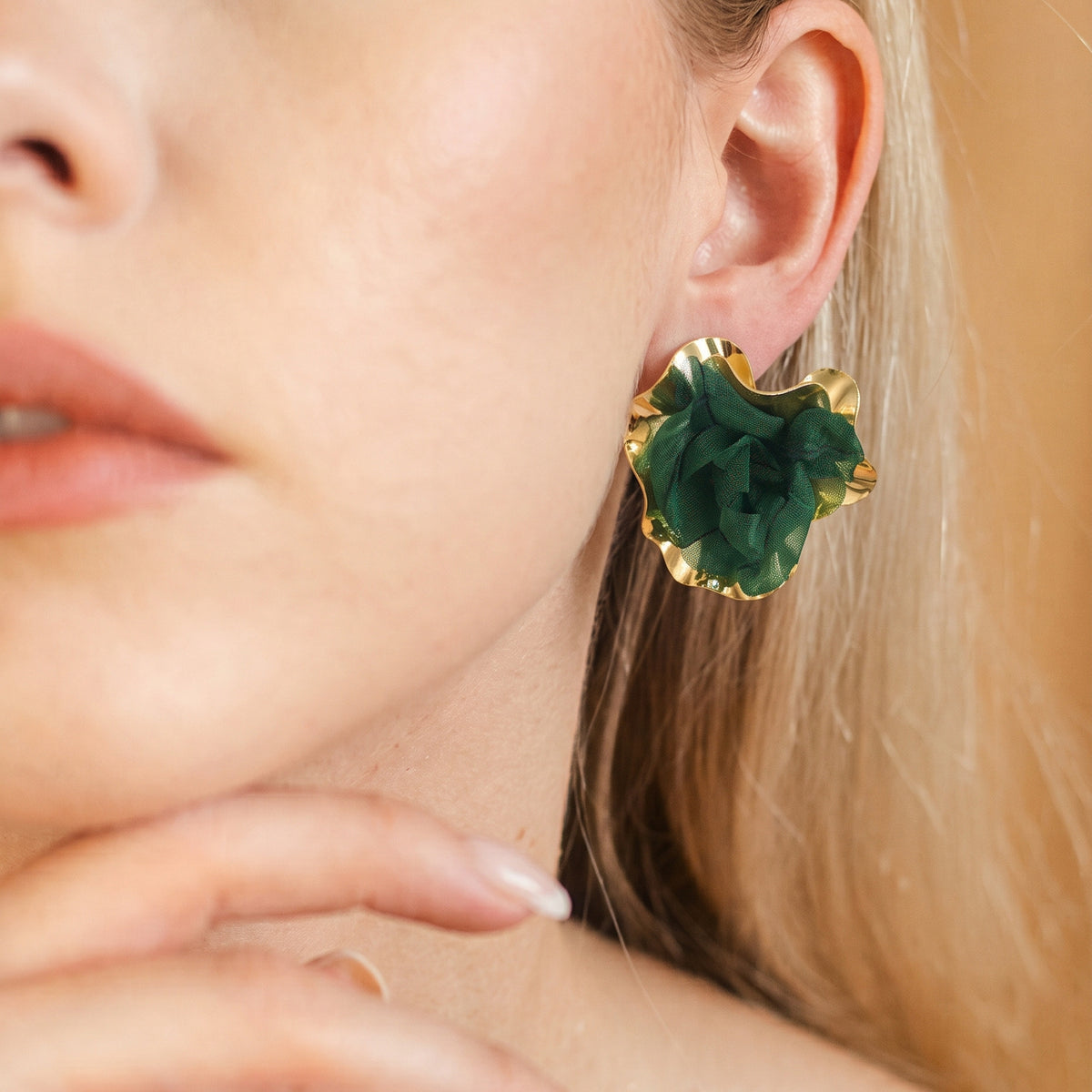 Floral statement earrings – dark green, worn