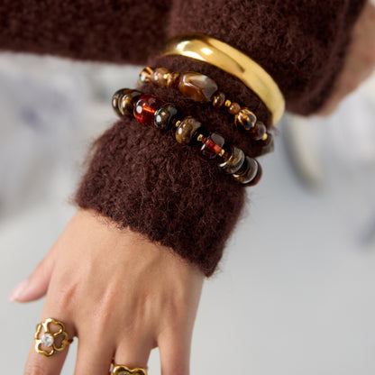 Amber kralenarmband bruin – om de pols