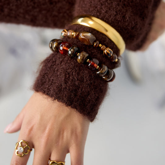 Amber kralenarmband bruin – om de pols