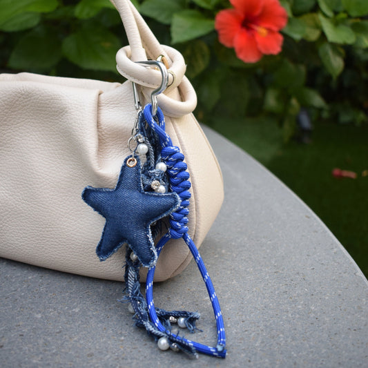 Fabric star bag charm blue on a bag