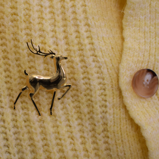 Hert broche goud