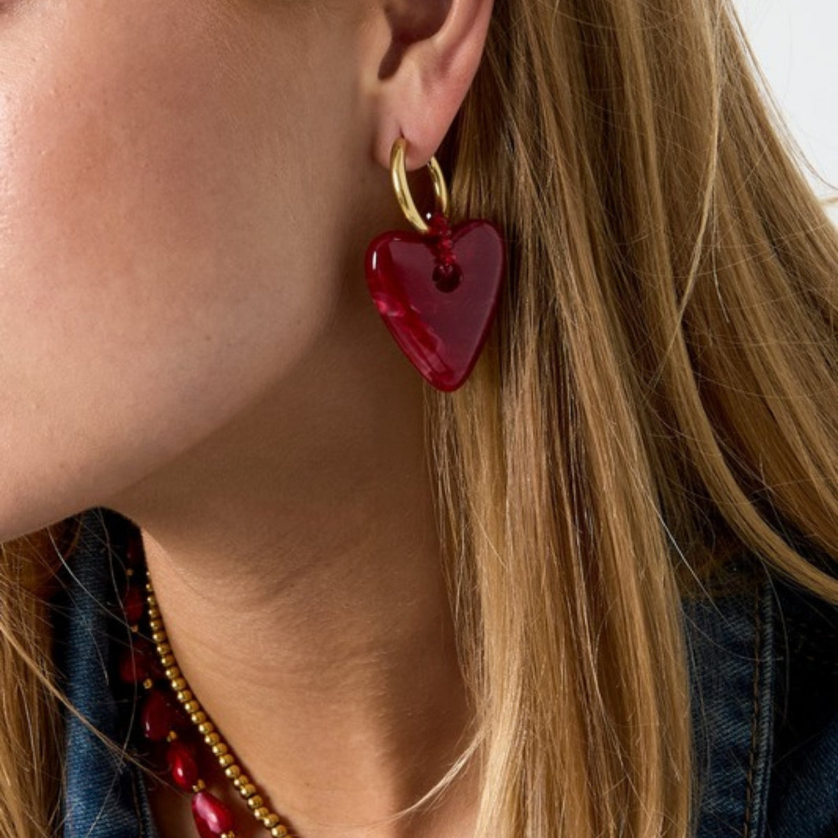Bordeaux heart earrings – lifestyle photo