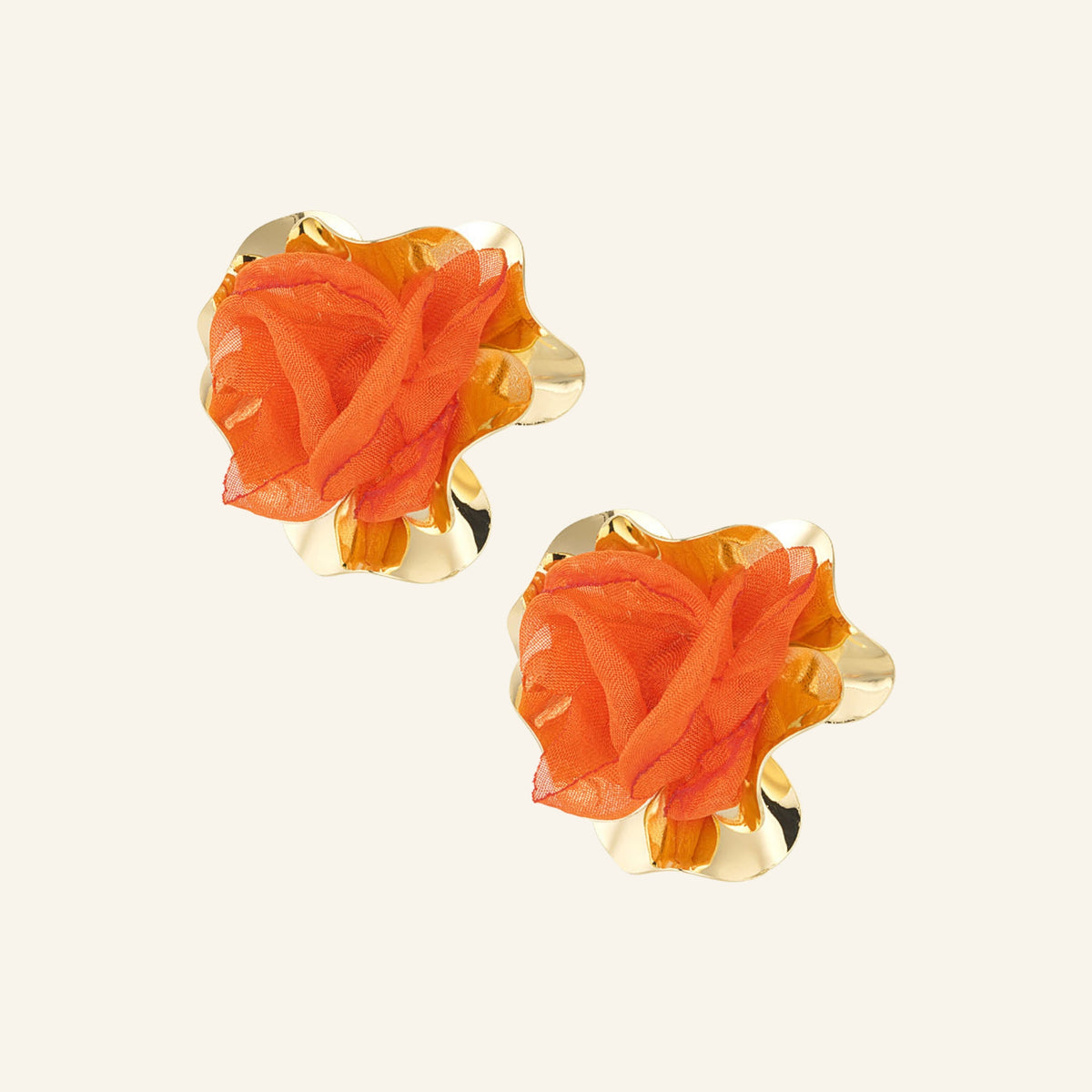 Floral statement earrings – orange, on beige background