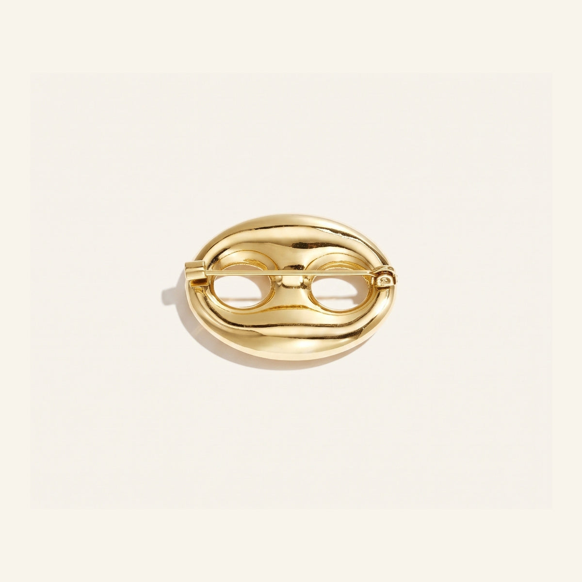 Link brooch gold