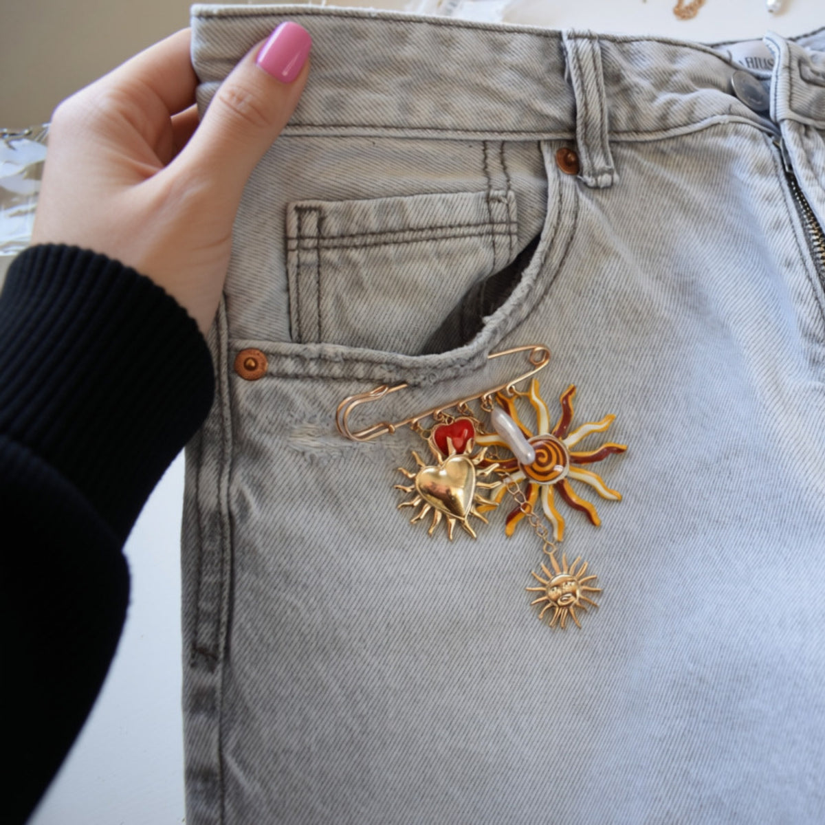 Zon en hart broche goud rood detail