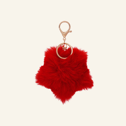 Fluffy flower bag charm – red, on beige background