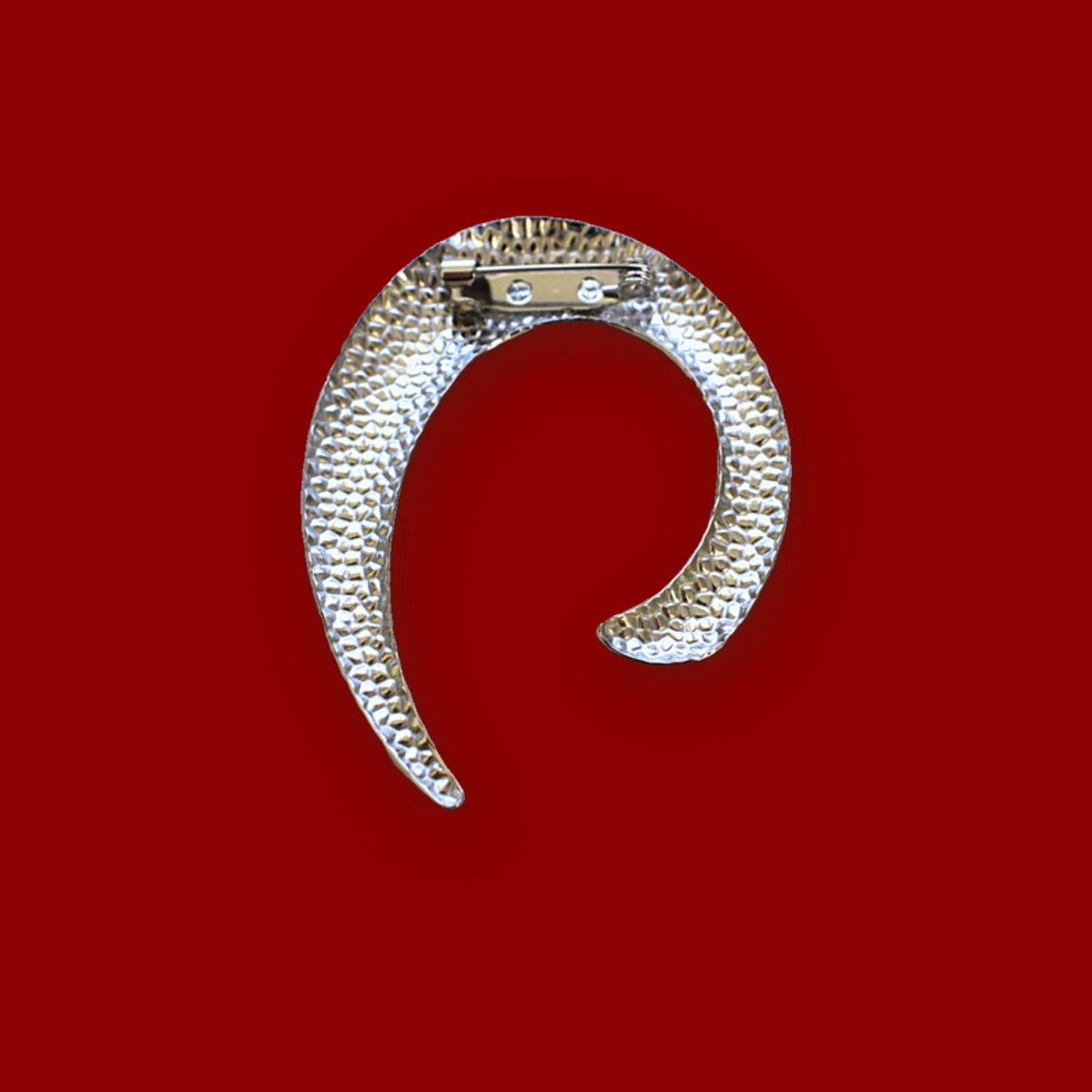 Gebogen broche zilver