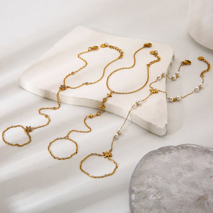 Ster hand chain steentjes goud wit - foto 4