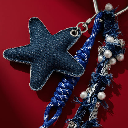 Ster van stof bag charm blauw detail
