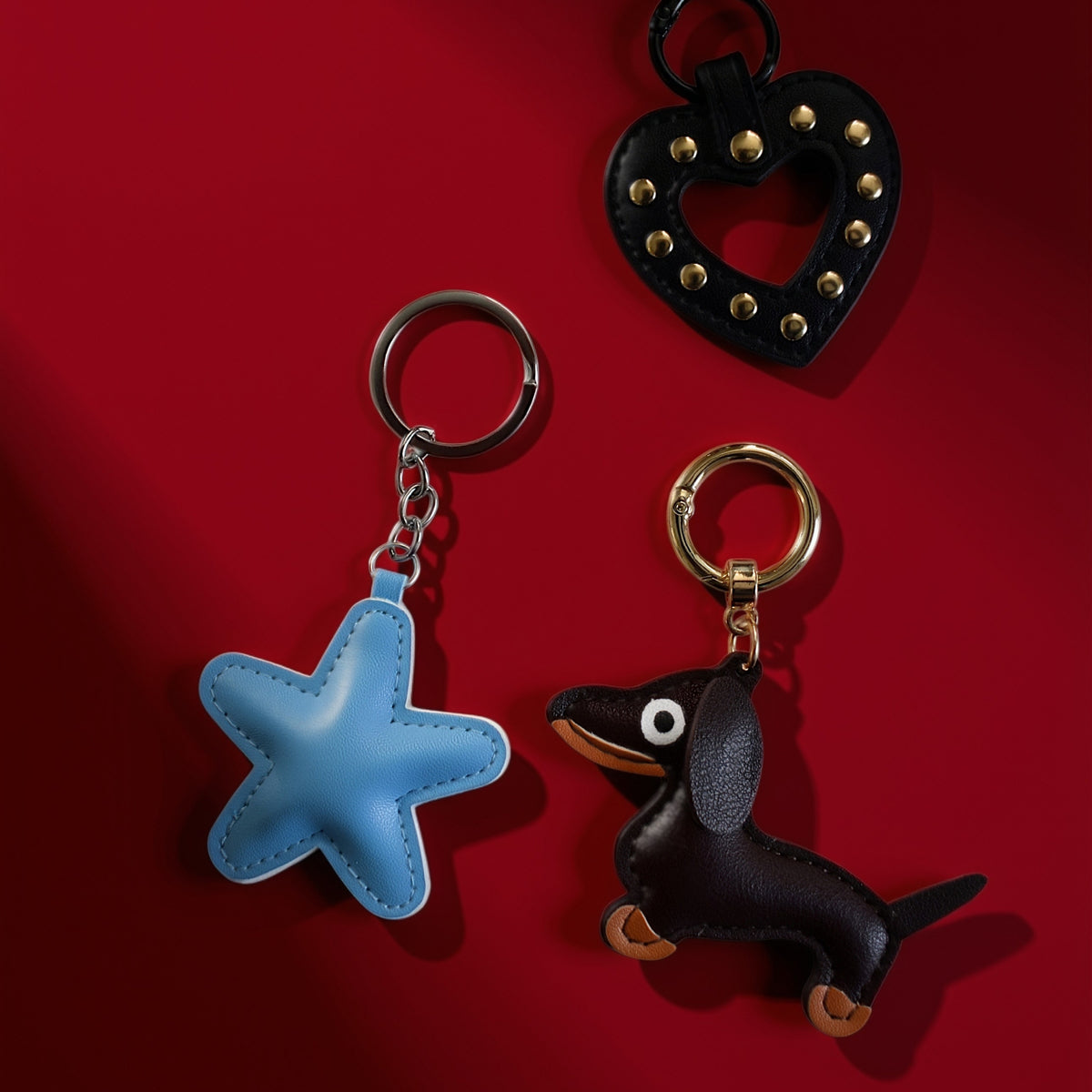 Ster van stof bag charm lichtblauw met hartjes bag charm op rood