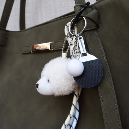 Teddy sports bag charm on a bag, side view