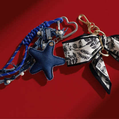 Ster van stof bag charm blauw