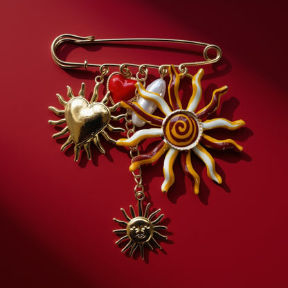 Zon en hart broche goud rood sfeerfoto