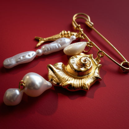 Schelp vis parel broche goud wit