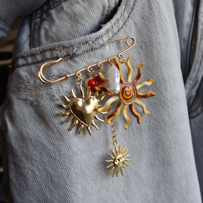 Zon en hart broche goud rood op rood
