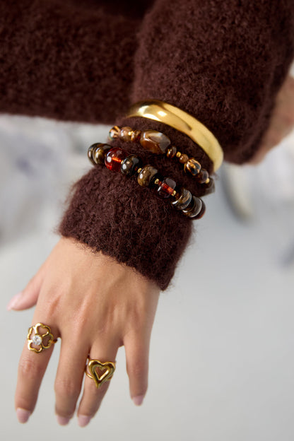 Amber kralenarmband bruin – om de pols