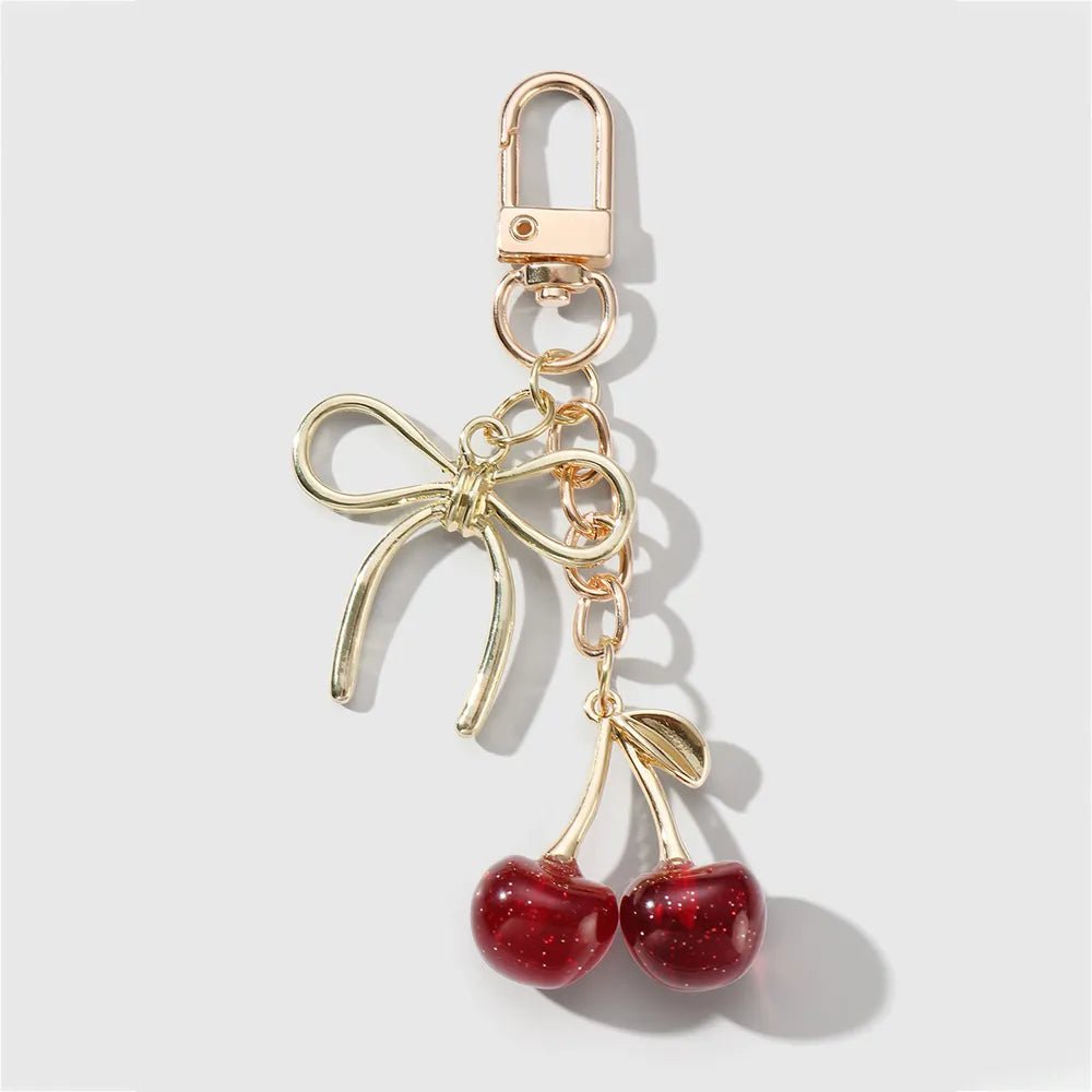 Kersen met strik bag charm rood