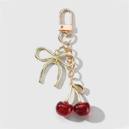 Kersen met strik bag charm rood