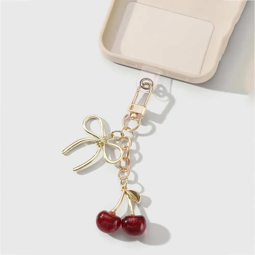 Kersen met strik bag charm rood