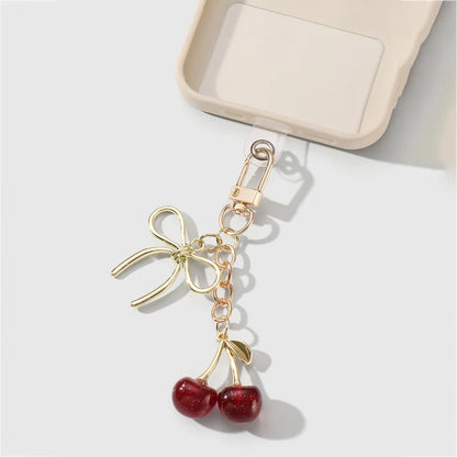 Kersen met strik bag charm rood
