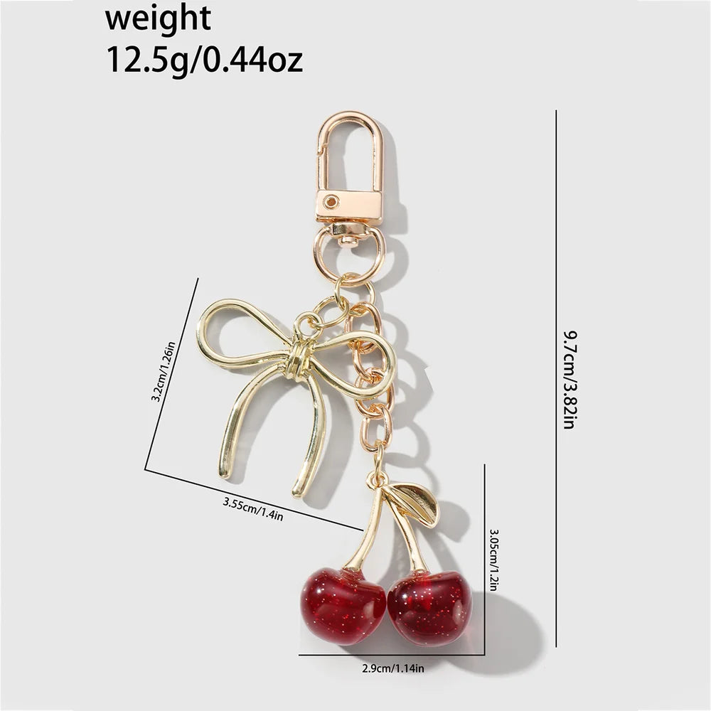 Kersen met strik bag charm rood