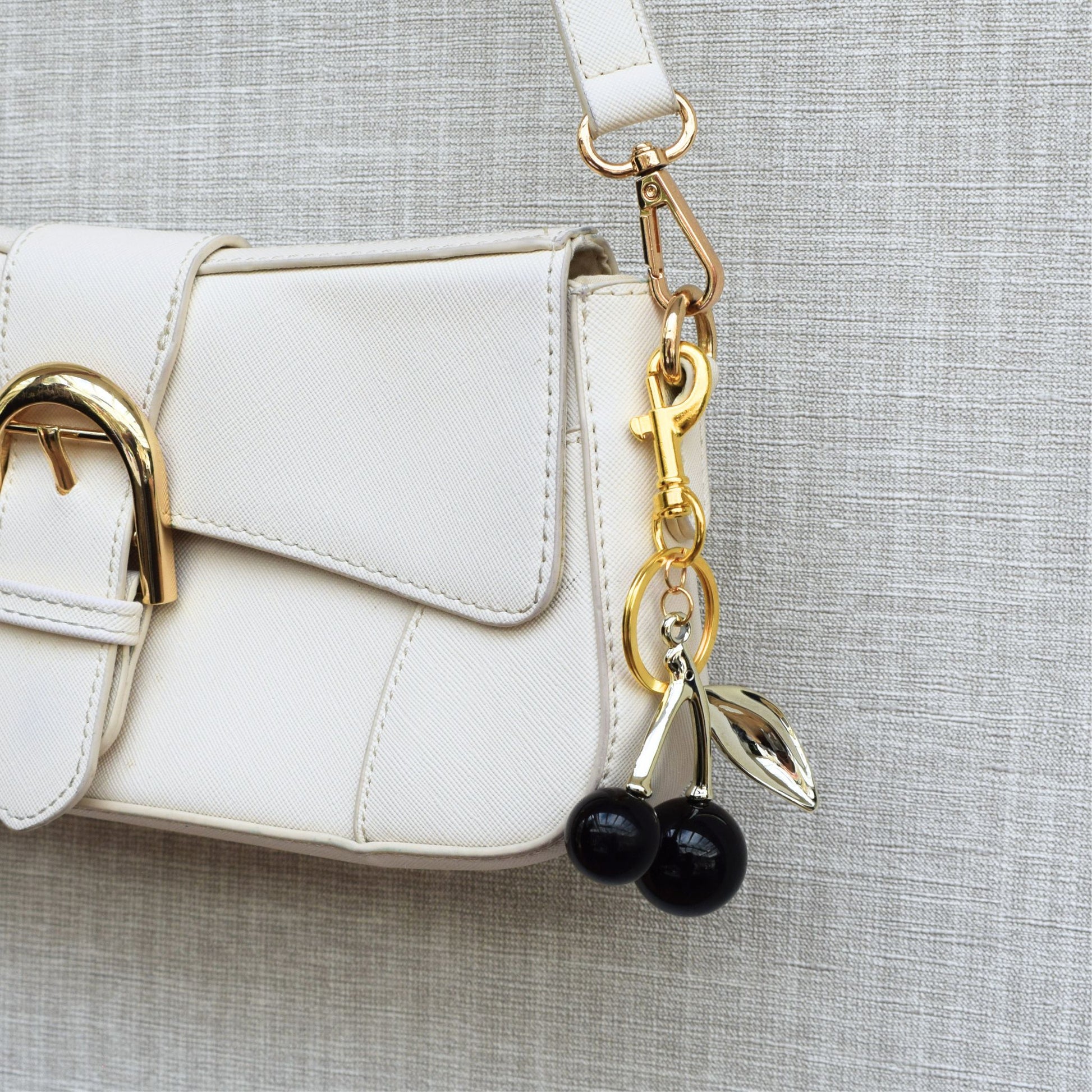 Kersen bag chain - Goud en zwart