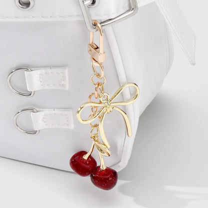 Kersen met strik bag charm rood