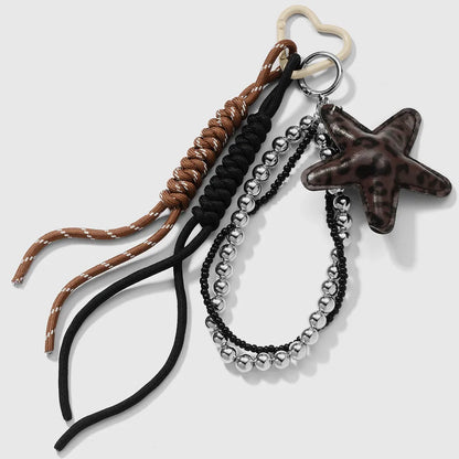 Ster bag charm met kralen bruin